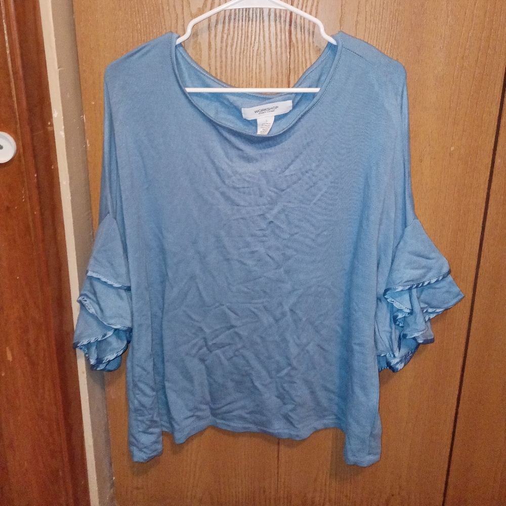 Workshop brand blue shirt. Size large.